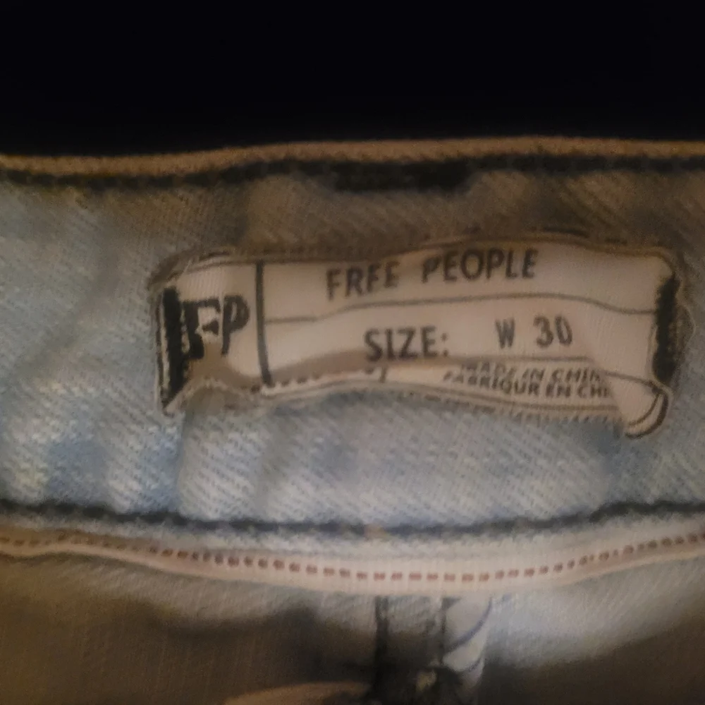 FREE PEOPLE Light Blue Distressed Denim‎ Shorts.